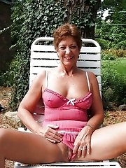 Over fifty years old woman spreading photos
